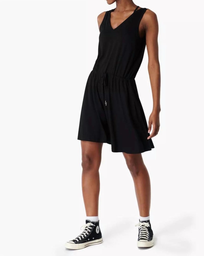 Front of a model wearing a size L Take It Easy Dress in Black in Black by Sweaty Betty. | dia_product_style_image_id:345270